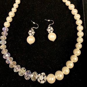 Necklace with earrings.